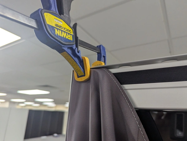 Bar clamp holding the first corner