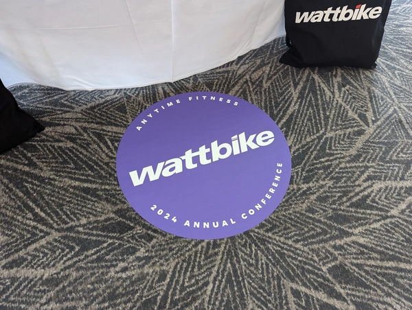 Temporary floor graphics to short pile carpet